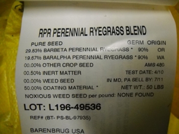Label of ryegrass blend consisting of seed coated with a substance to enhance retention of moisture on the seed coat to help ensure optimum germination. The weight of the coating is 50 % of the bag contents.